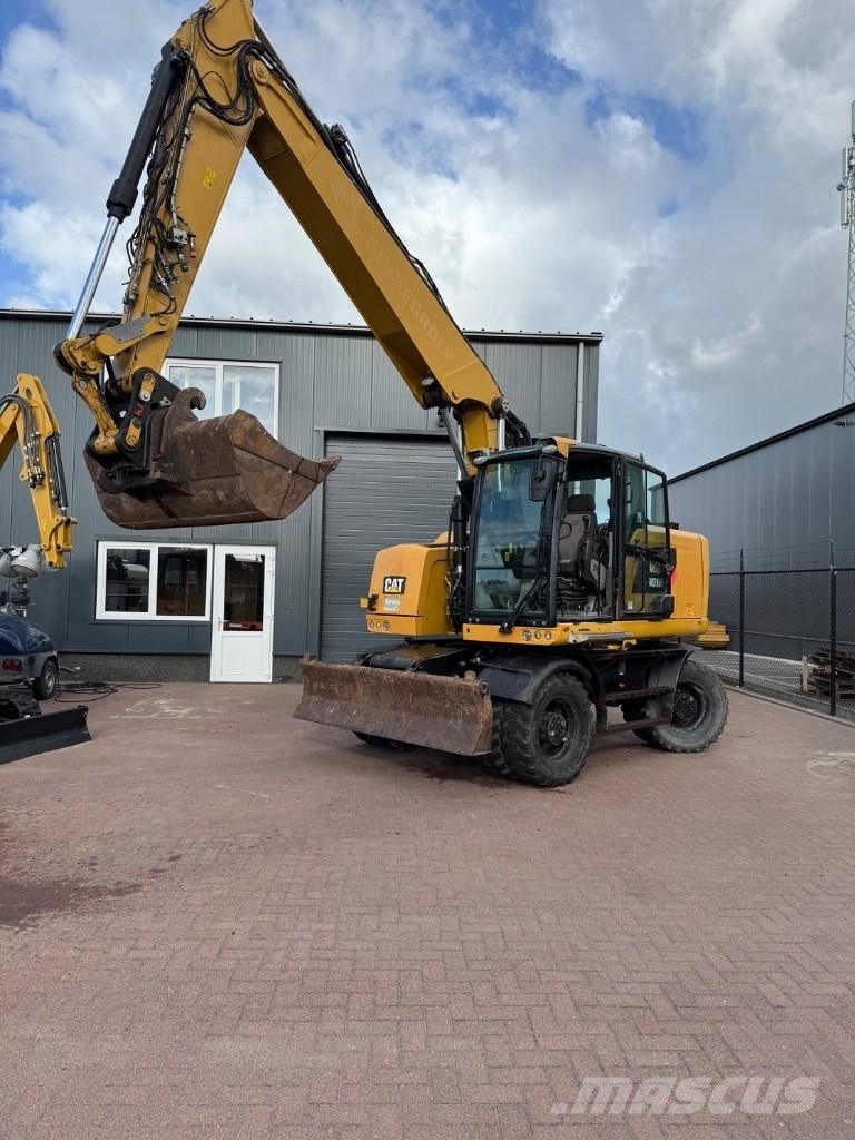 CAT 318 Excavatoare cu roti