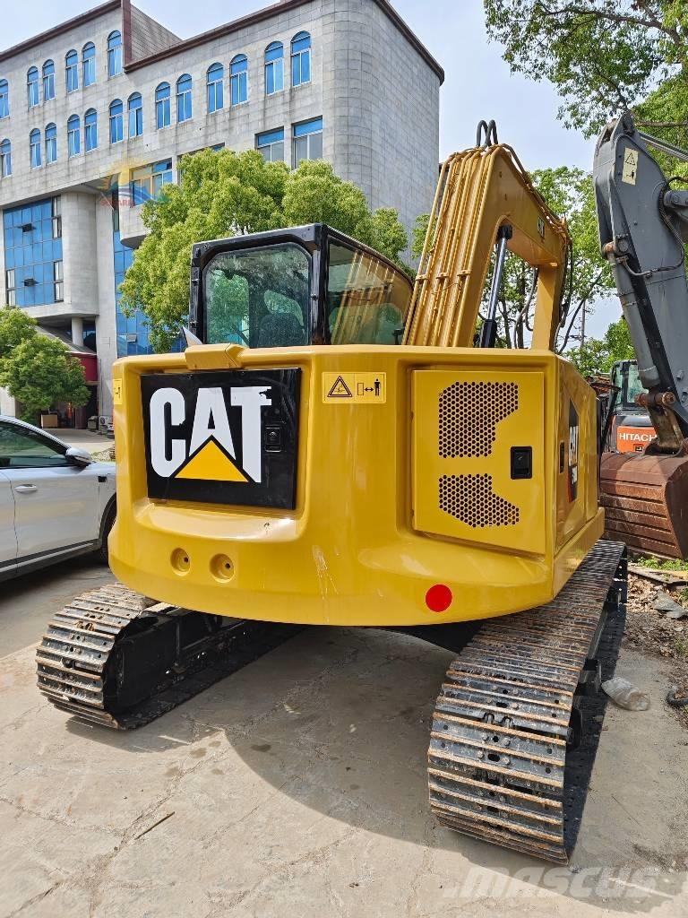CAT 310 Excavatoare pe șenile
