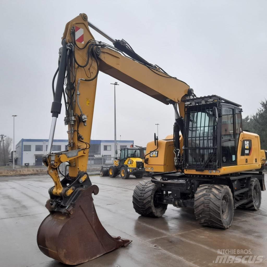 CAT M 318 F Excavatoare cu roti