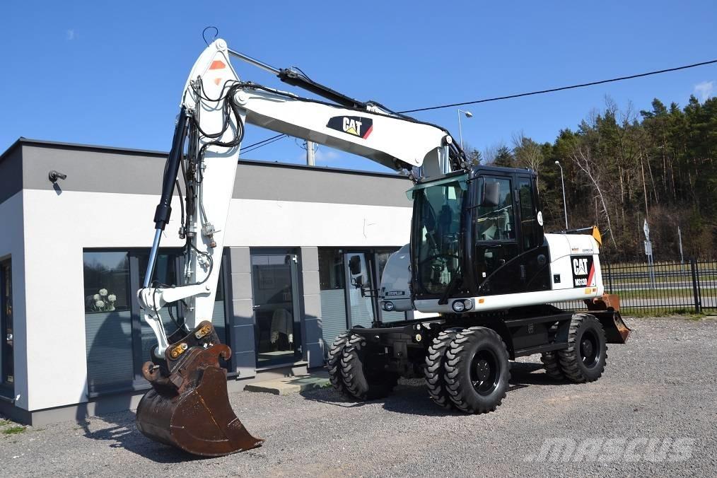 CAT M 313 D Excavatoare cu roti