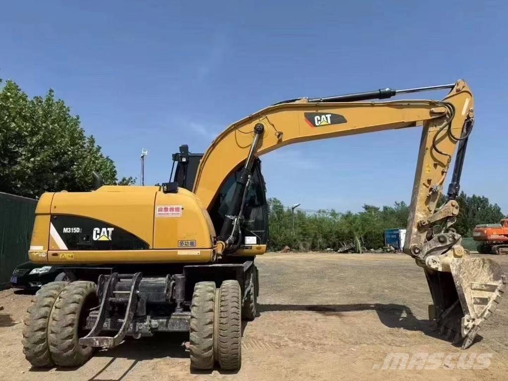 CAT M 315 D Excavatoare cu roti