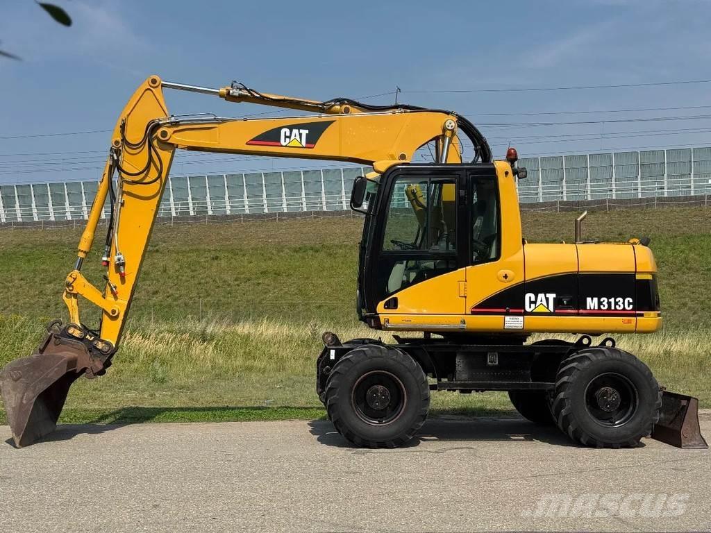 CAT M313C Excavatoare cu roti