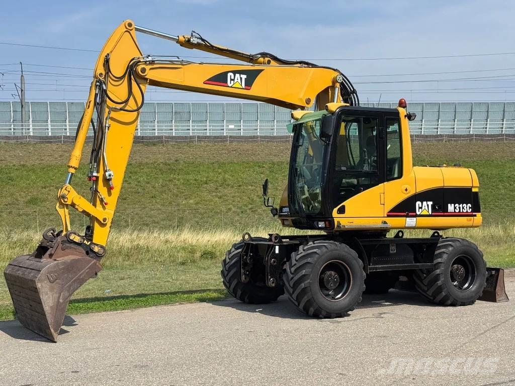 CAT M313C Excavatoare cu roti