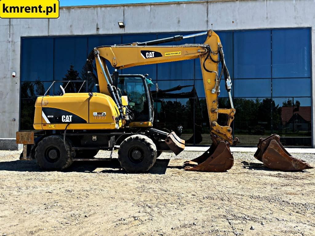 CAT M 313 D Excavatoare cu roti