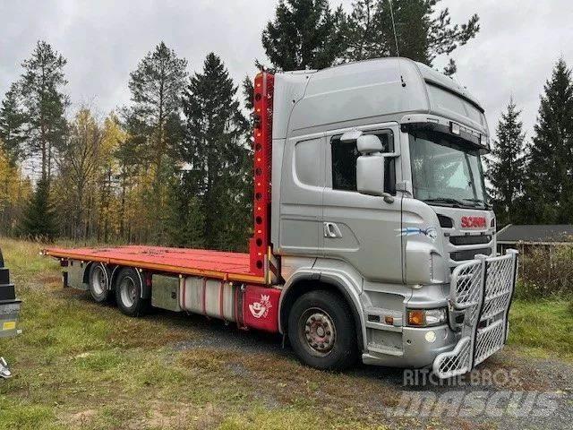 Scania R 560 6*2 Camioane platforma/prelata