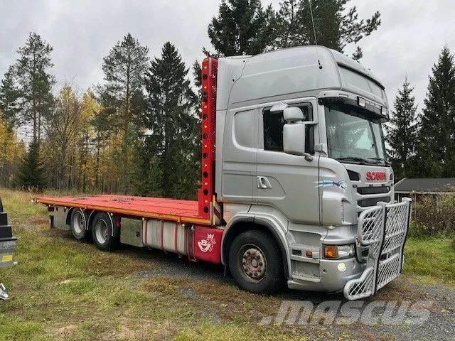 Scania R 560 6*2 Camioane platforma/prelata