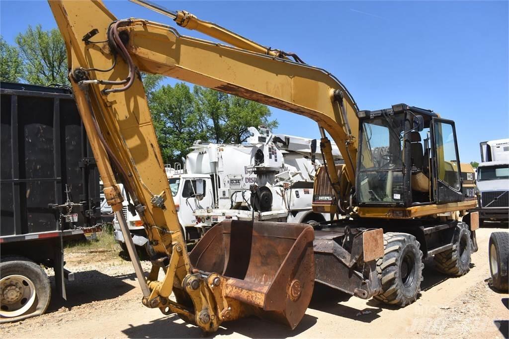 CAT M318 Excavatoare cu roti