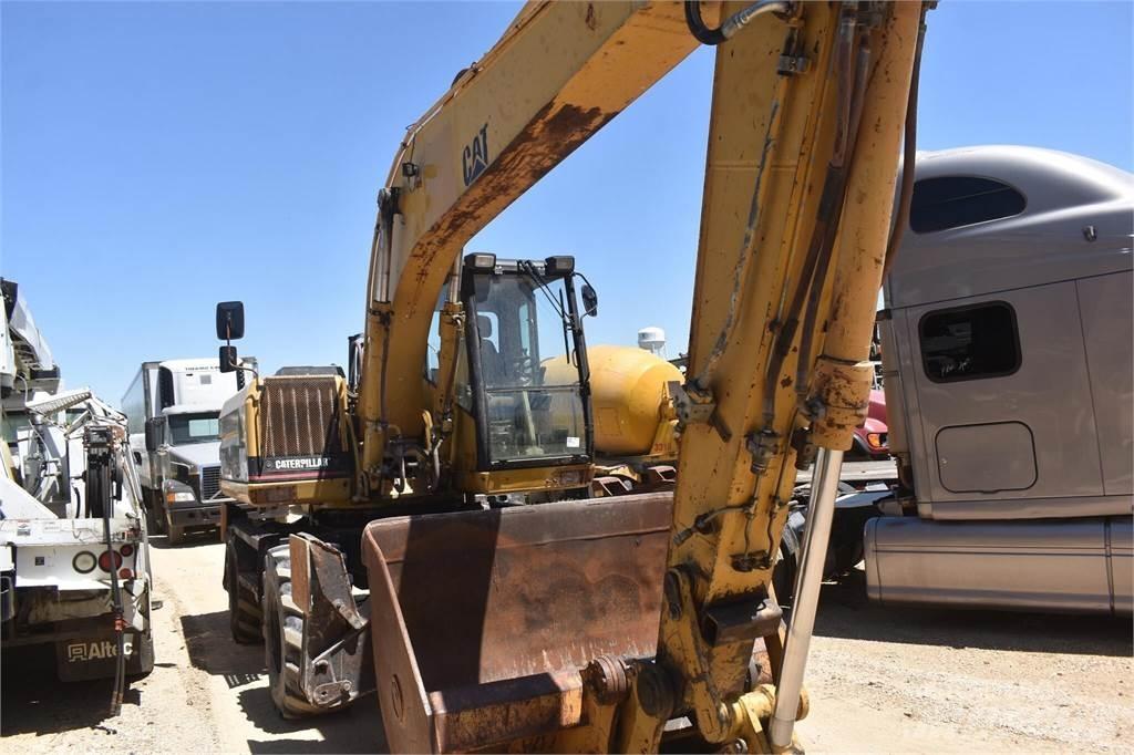 CAT M318 Excavatoare cu roti