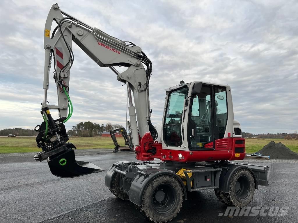 Takeuchi TB 395 W Excavatoare cu roti