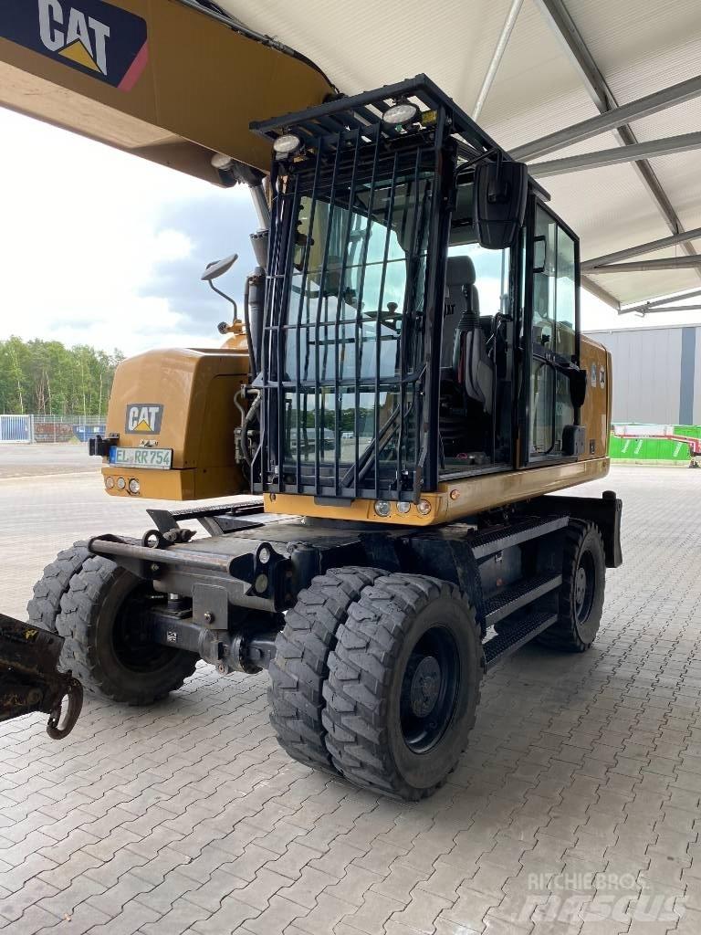 CAT M 320 F Excavatoare cu roti