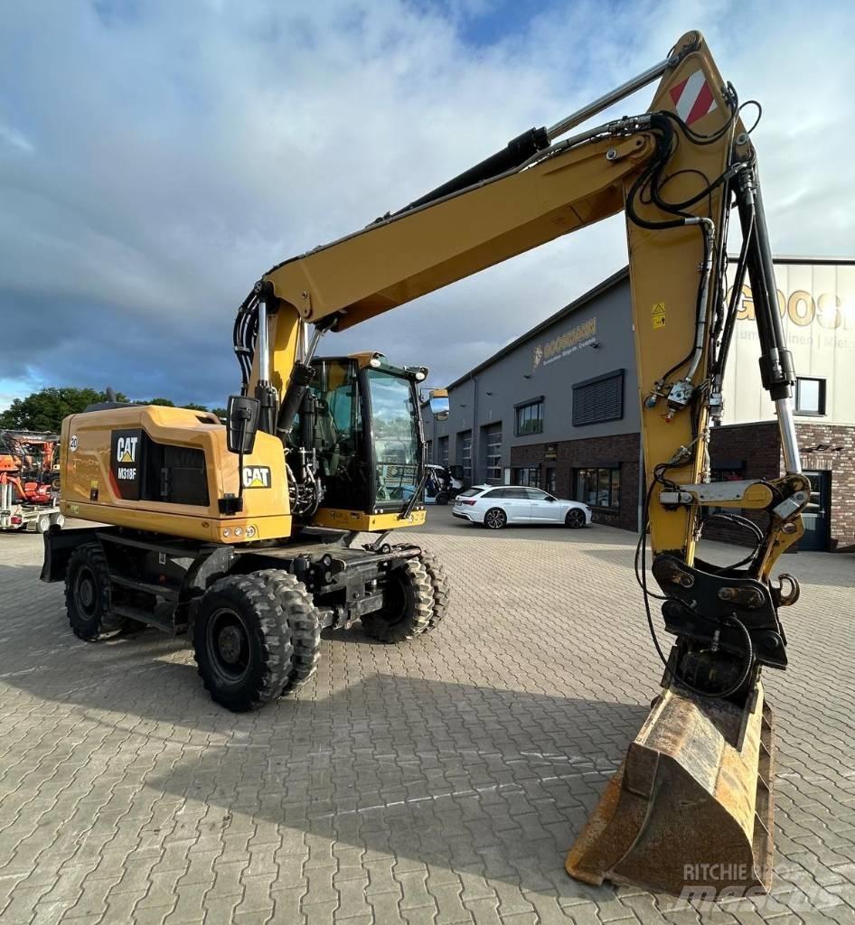 CAT M 318 F Excavatoare cu roti