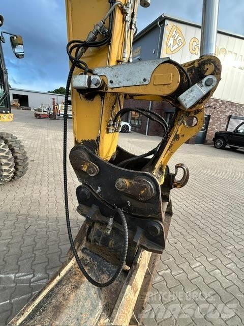CAT M 318 F Excavatoare cu roti