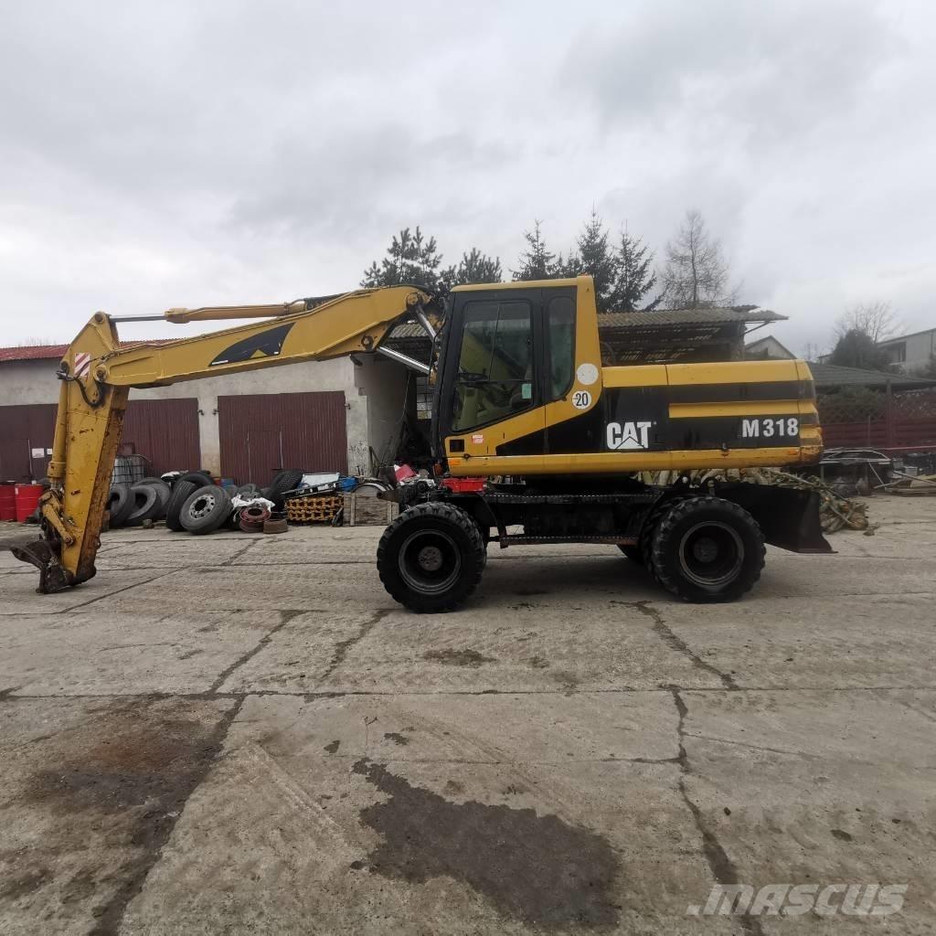 CAT M 318 B Excavatoare cu roti