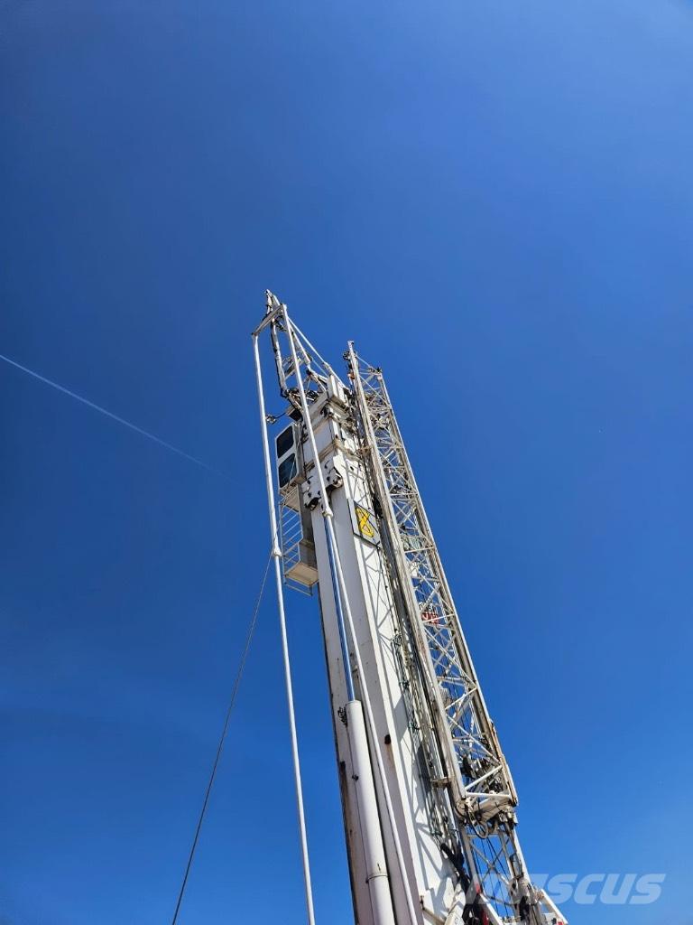 Spierings AT5 - 599 Self erecting cranes