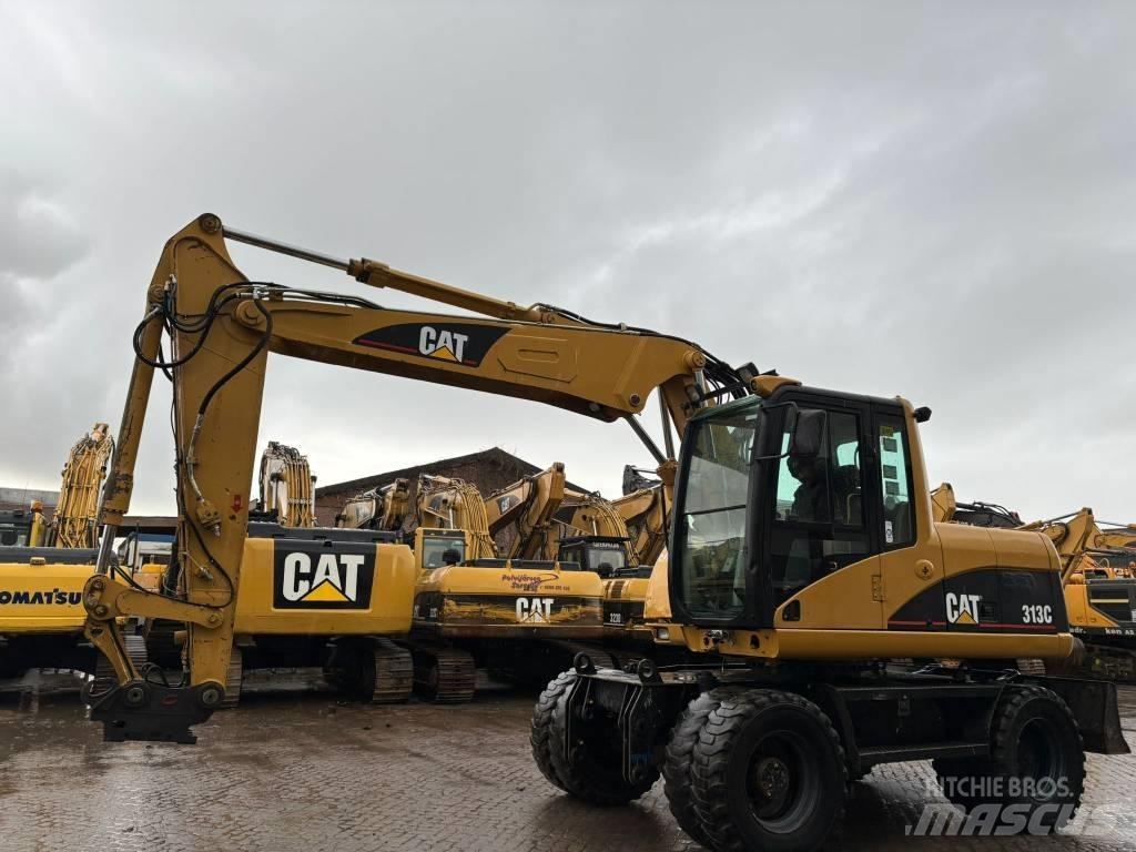 CAT M 313 C Excavatoare cu roti