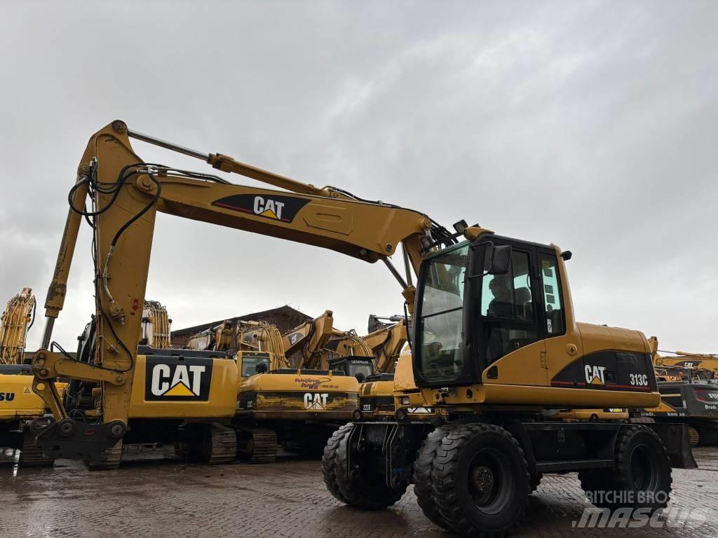 CAT M 313 C Excavatoare cu roti