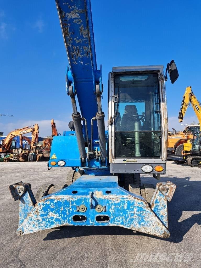 Fuchs MHL 320 D Paleta de manipulare
