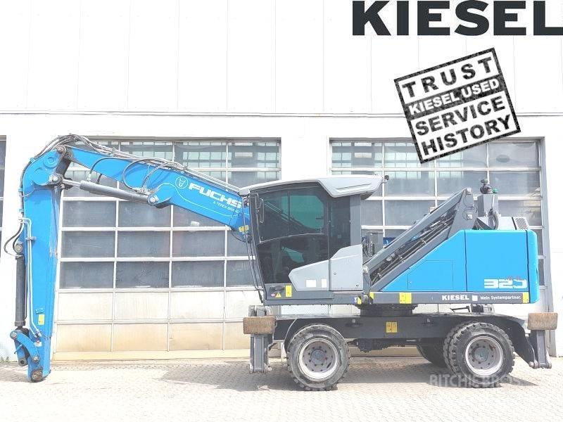 Fuchs MHL 320 F Paleta de manipulare