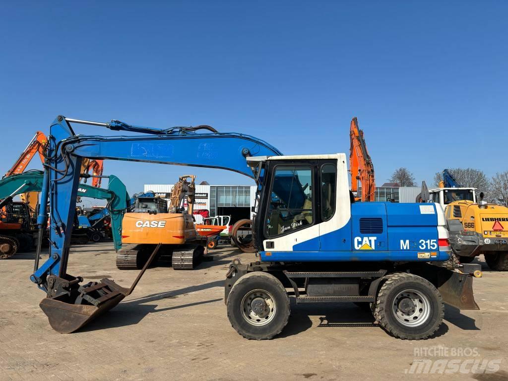 CAT M 315 Excavatoare cu roti