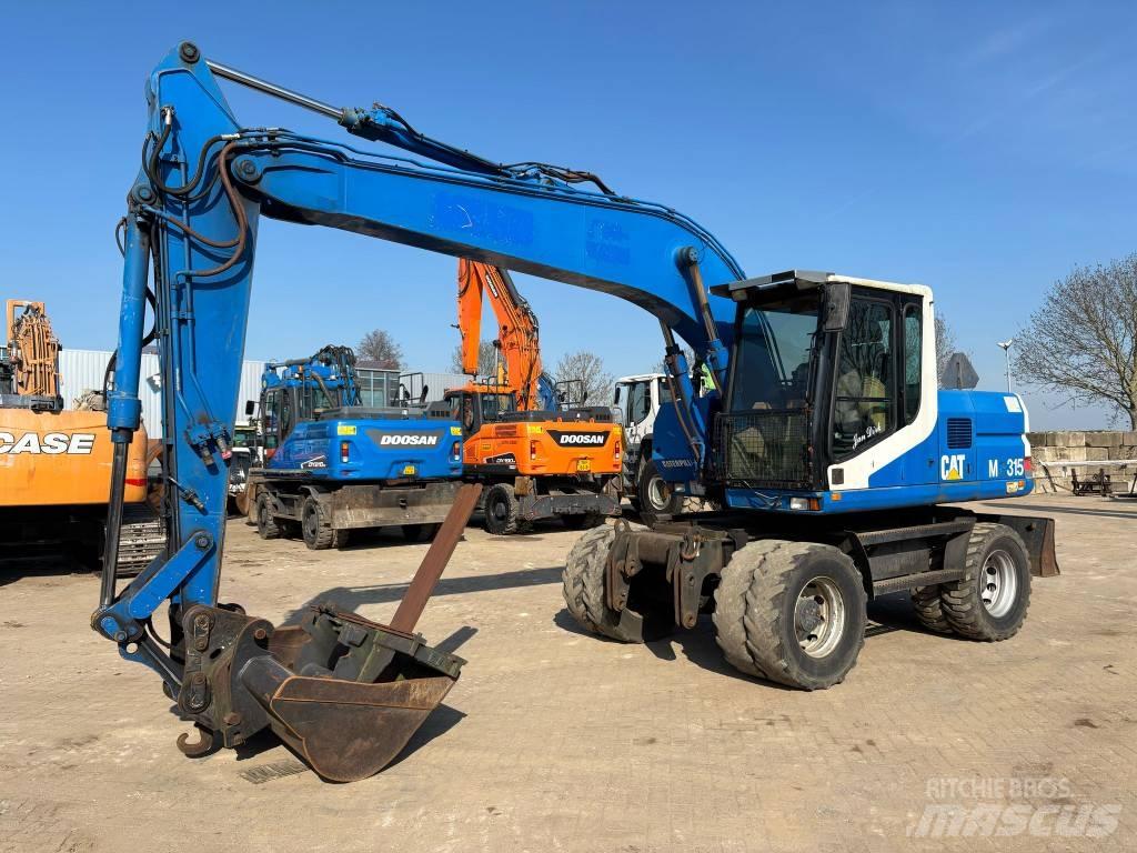 CAT M 315 Excavatoare cu roti