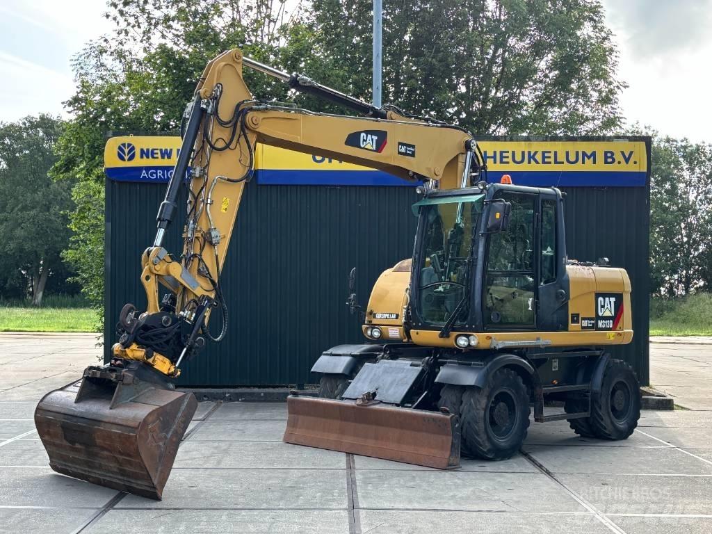 CAT M 313 D Excavatoare cu roti