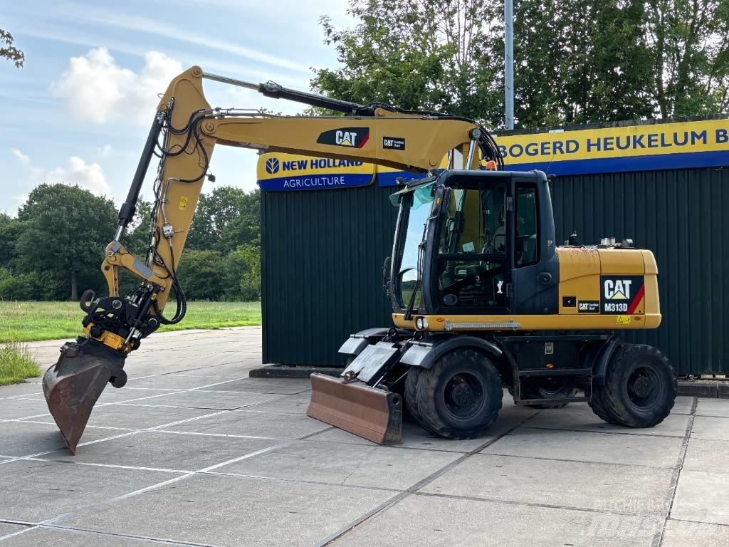 CAT M 313 D Excavatoare cu roti