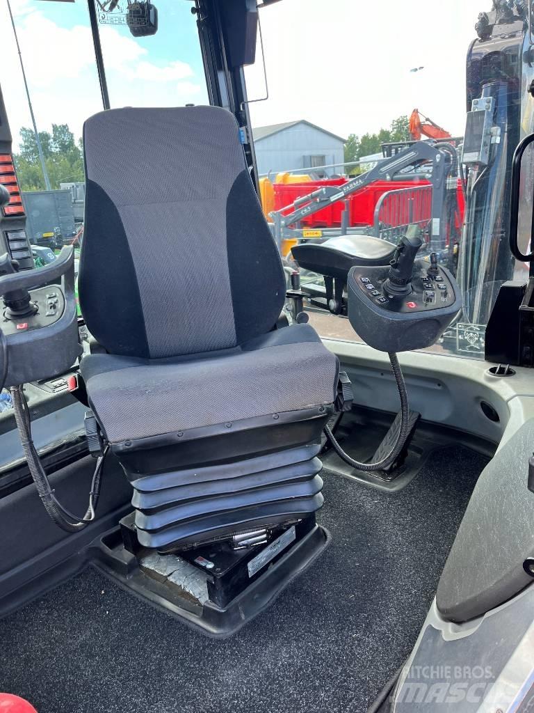 Huddig 1260C City Buldoexcavatoare