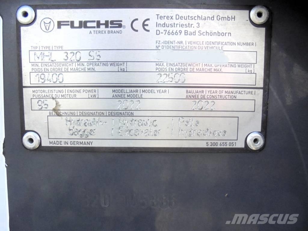 Fuchs MHL 320 Paleta de manipulare