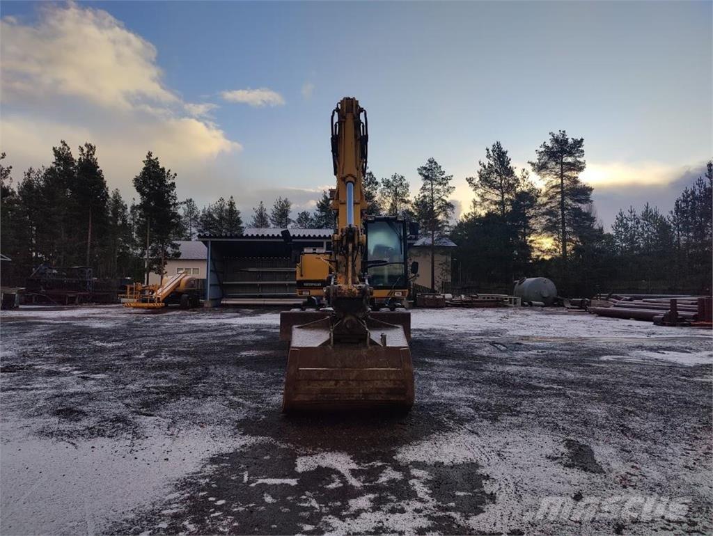 CAT M315 Excavatoare cu roti