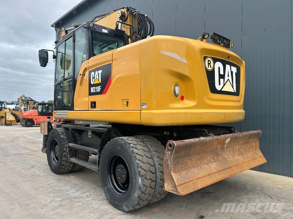 CAT M318F Excavatoare cu roti