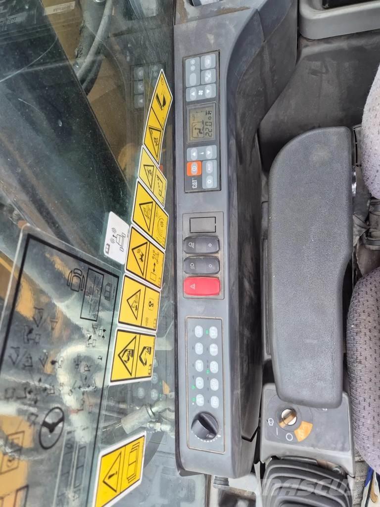 CAT M 318 F Excavatoare cu roti