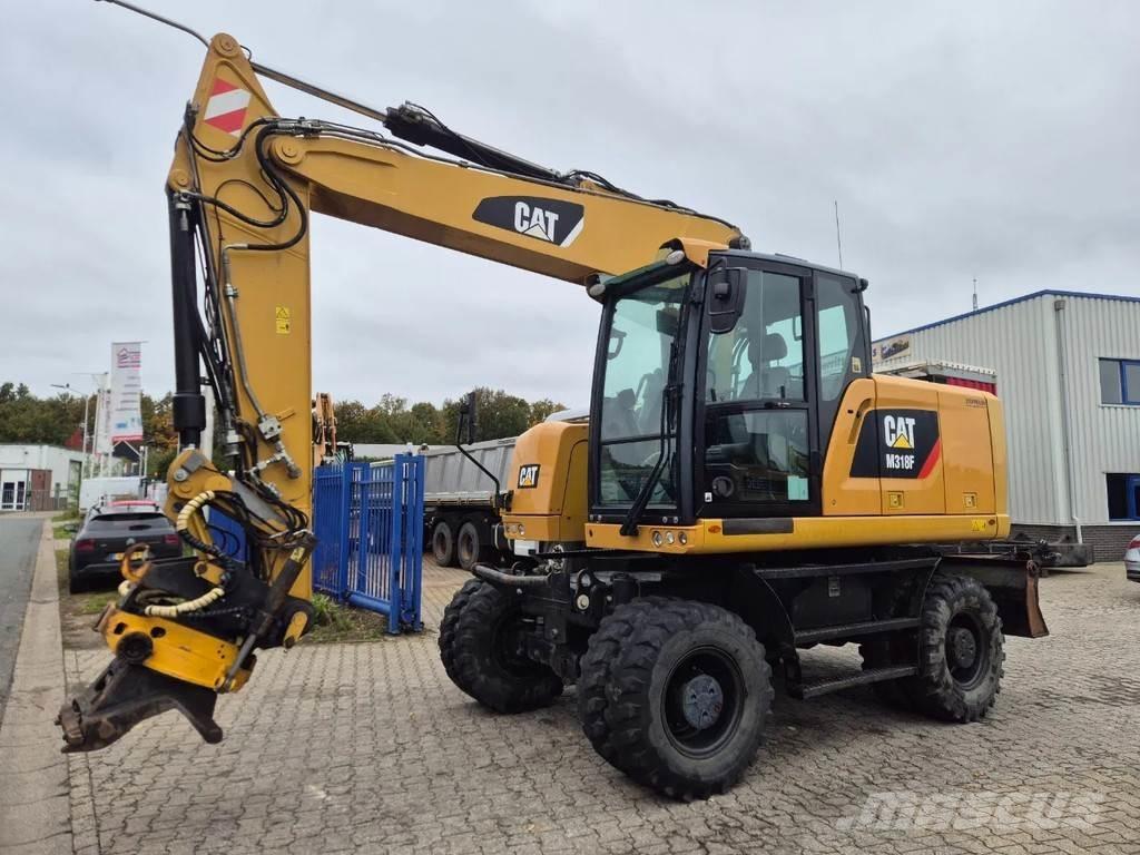 CAT M 318 F Excavatoare cu roti