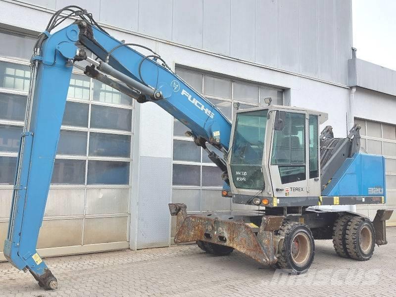 Fuchs MHL 320 F Paleta de manipulare