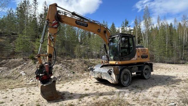 CASE WX 148 Excavatoare cu roti