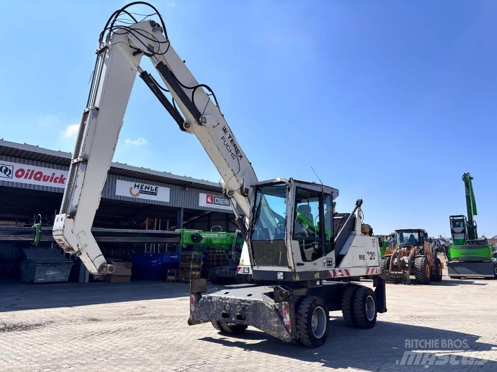 Fuchs MHL 320 Paleta de manipulare