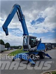Fuchs MHL 331 Paleta de manipulare