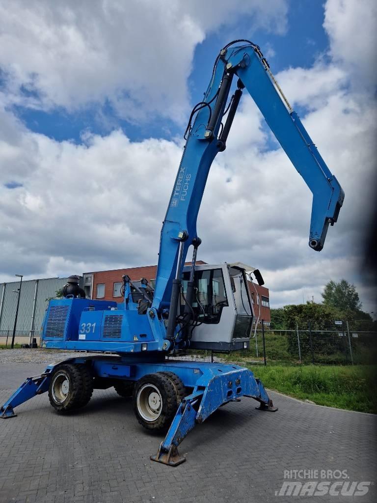 Fuchs MHL 331 Paleta de manipulare