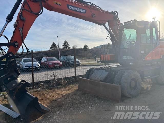  Dosan DX 140 Buldoexcavatoare