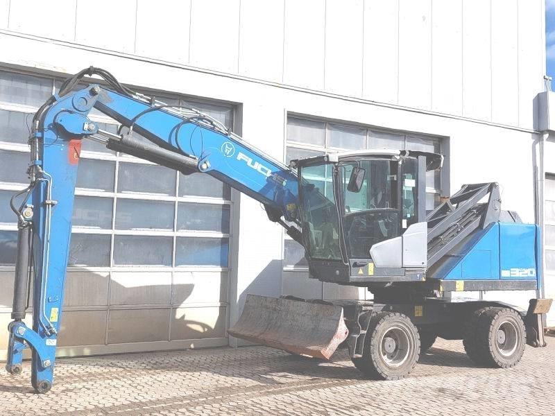Fuchs MHL 320 F Paleta de manipulare