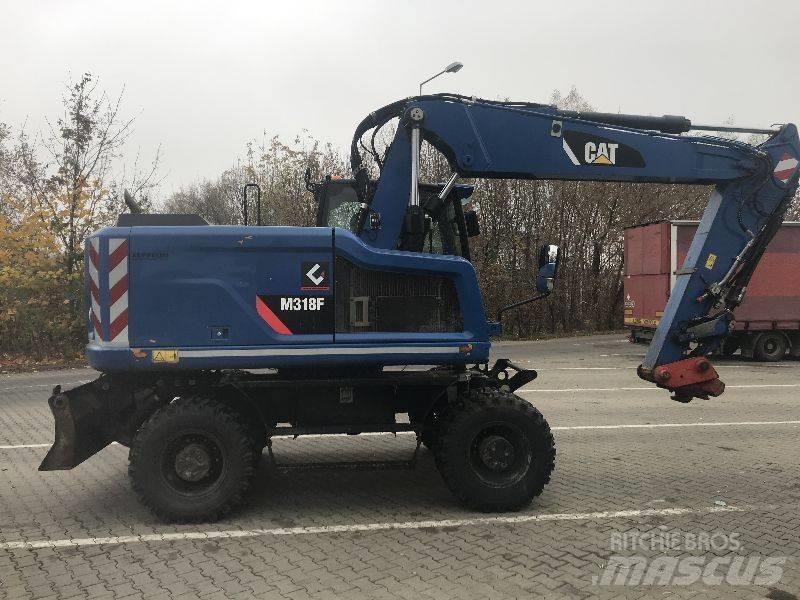 CAT M318F Excavatoare cu roti