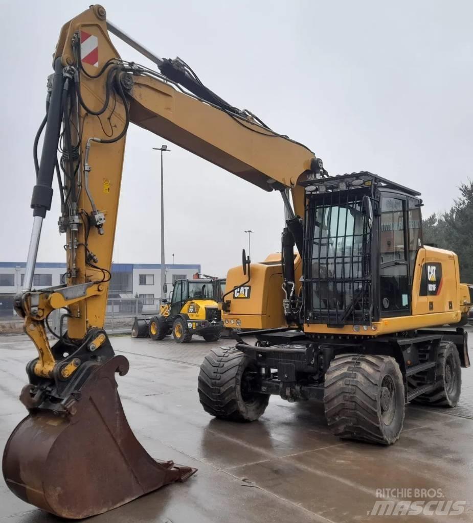 CAT M 318 F Excavatoare cu roti