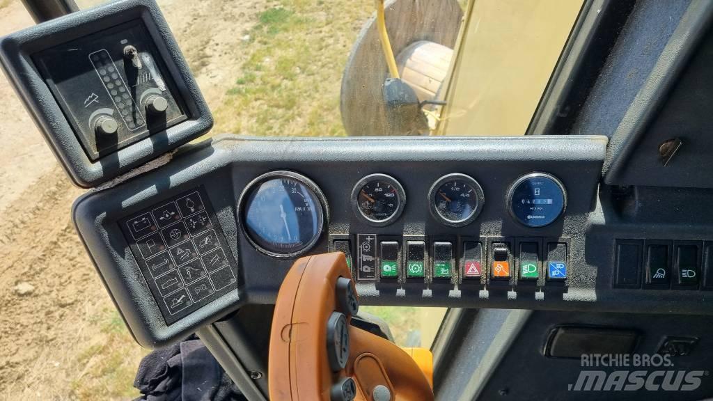 New Holland TC 56 Combine de secerat