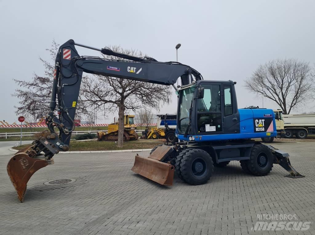 CAT M315D 2 buckets Excavatoare cu roti