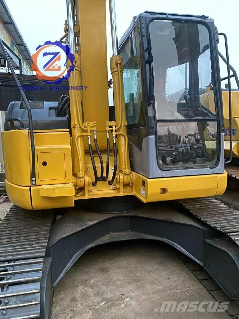 Komatsu PC 128 US Excavatoare 7t - 12t