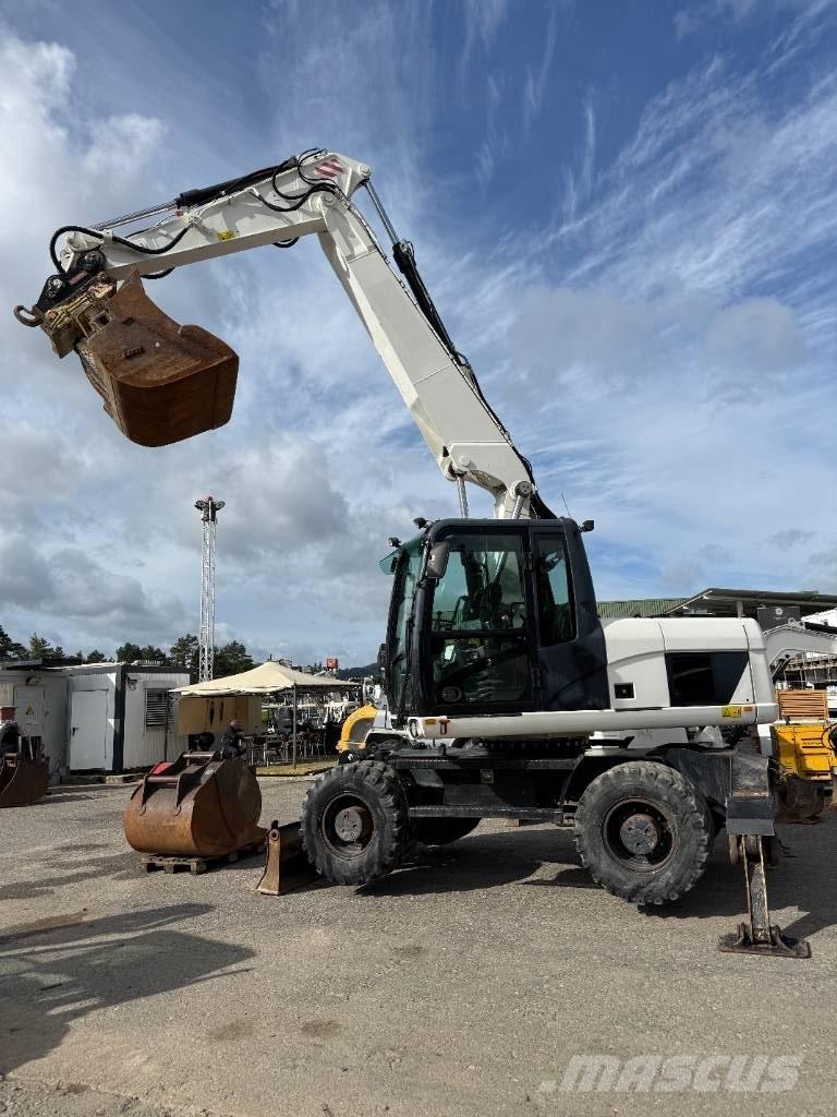 CAT M 316 D Excavatoare cu roti