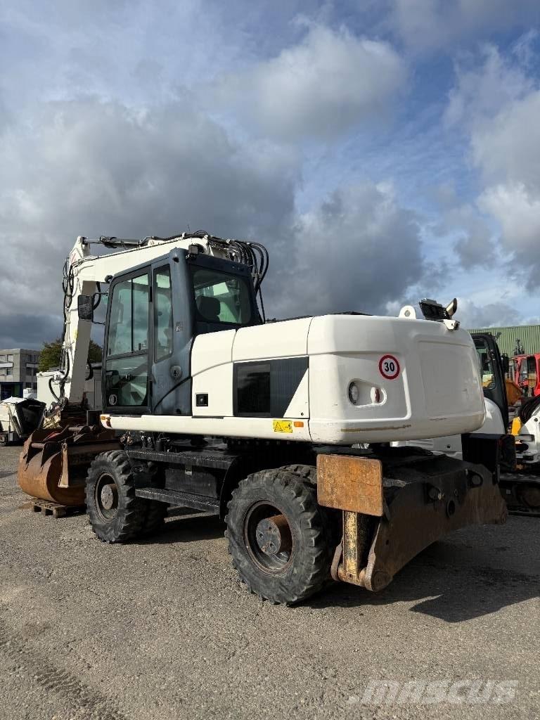CAT M 316 D Excavatoare cu roti