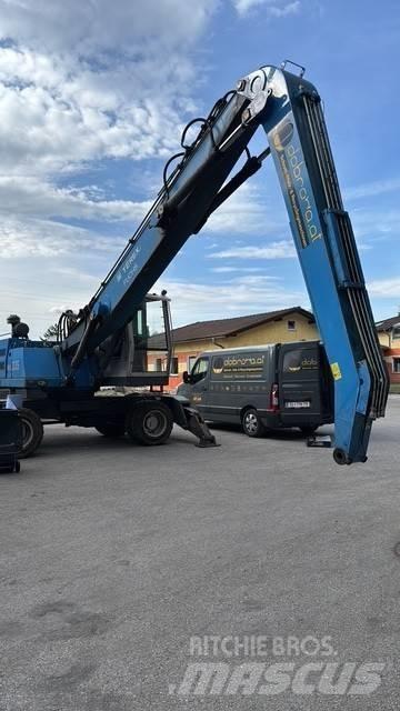 Fuchs MHL 335 Paleta de manipulare