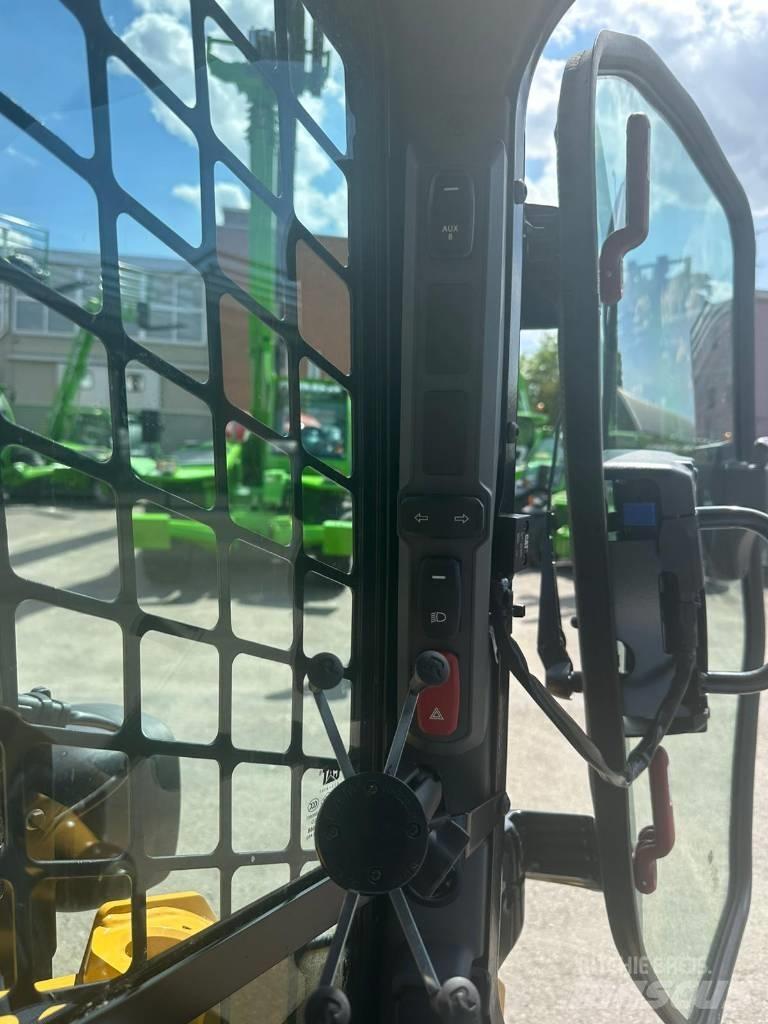CAT 255 Încarcatoare cu excavator