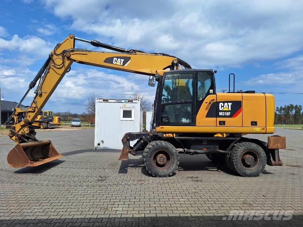 CAT M 318 F Excavatoare cu roti