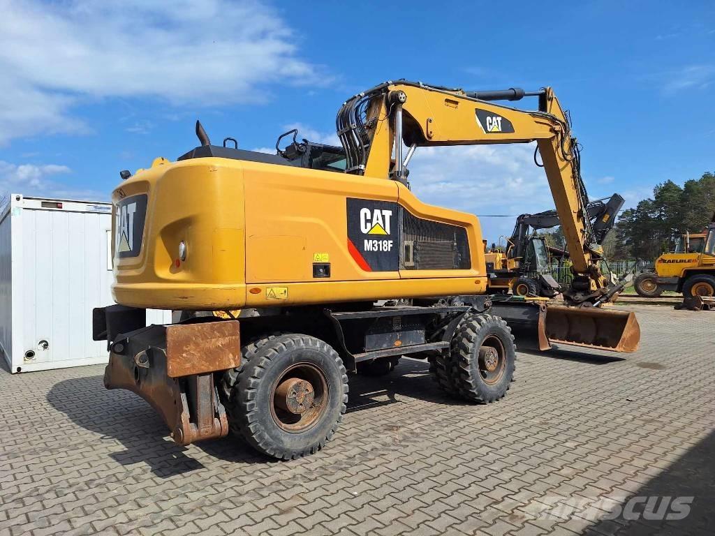 CAT M 318 F Excavatoare cu roti